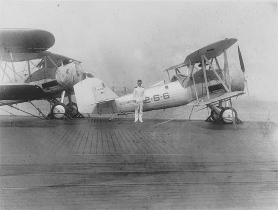 Unidentified Officer and Vought Corsair, A-8110, Carrier Deck, Ca. 1928-30 (Source: Barnes) 